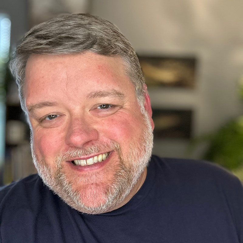 Travis Wilkerson, LPC, Brand and Marketing Coordinator